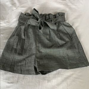 grey plaid fabric shorts